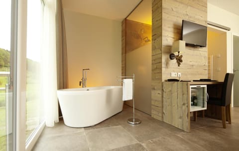 Eco-friendly toiletries, hair dryer, bathrobes, slippers