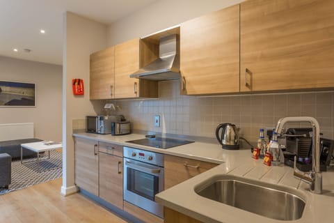 2 Bedroom Suite - Penthouse | Private kitchen | Full-size fridge, microwave, oven, stovetop