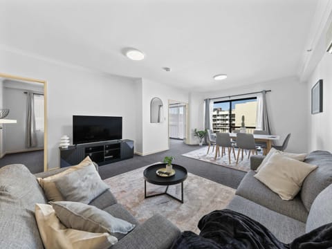 The open layout creates a spacious feel, ideal for both relaxing and socializing.