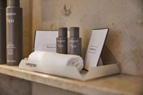 Deluxe Room, 1 Queen Bed | Bathroom | Shower, hair dryer, bathrobes, slippers