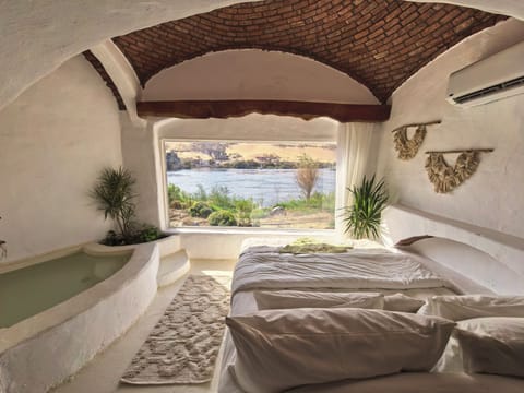Family Suite, River View | In-room safe, blackout drapes