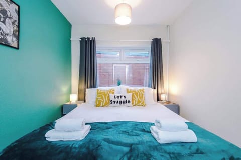 Stylish bedroom featuring a king-size bed that can be converted into two single beds upon request.