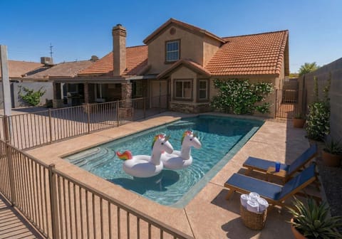 Floaties and pool toys provided by request.