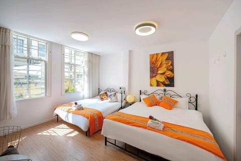 Comfort Quadruple Room, Kitchenette, Courtyard Area | Free WiFi, bed sheets