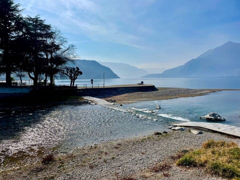 Sky, Blue, Water, Body Of Water, Mountainous Landforms, Coastal And Oceanic Landforms, Coast, Horizon, Rock, Landscape