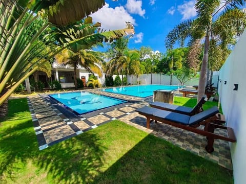 Deluxe Double Room, Garden View | Pool | Outdoor pool