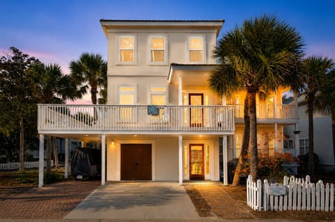 Beautiful beach house just steps away from the sugar-white sands.