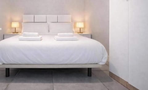 Deluxe Apartment | Down comforters, individually decorated, individually furnished