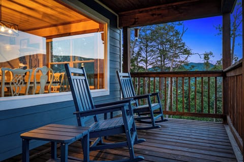 Covered deck with rocking chairs for relaxing outdoors & views