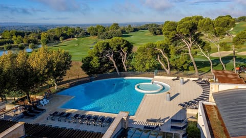 Take in gorgeous views while lounging around the on-site outdoor pool.