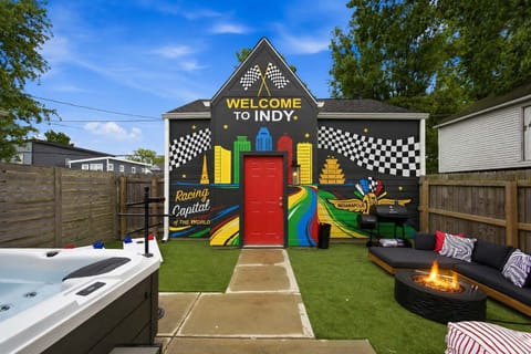 The ultimate outdoor hangout — fire up the pit, hop in the hot tub & enjoy.