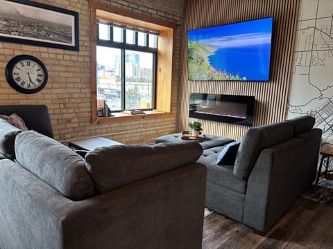 Corner living room with downtown views