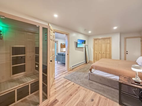 【Bedroom + Sauna】 Built-in infrared sauna against the wall — sweat the altitude out post-hike