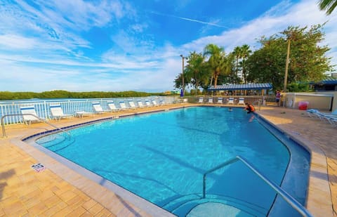Resort-style community pool overlooking the water