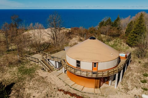 Luxury yurt retreat nestled among the dunes with panoramic Lake Michigan views, expansive decking, and unforgettable sunsets.