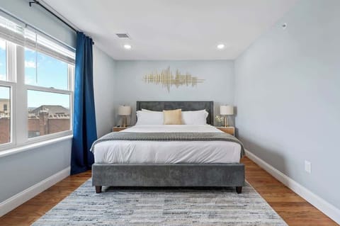 Primary bedroom retreat with private ensuite bath featuring modern fixtures, a sleek vanity, and a shower/tub combo. Spacious layout with abundant natural light creates the perfect blend of comfort and privacy.