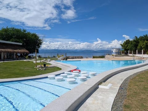 Outdoor pool, open 8:00 AM to 10:00 PM, pool umbrellas, sun loungers