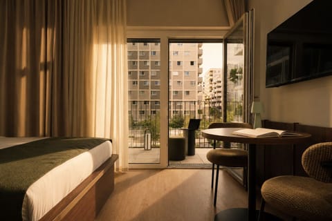 Premium Studio, Balcony | Minibar, in-room safe, desk, laptop workspace