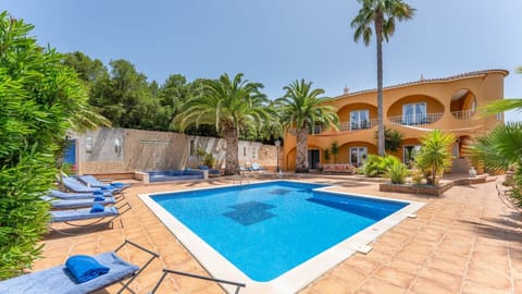 Sunny pool days made easy in Torre, Alcantarilha. Lounge, swim, play ping-pong and relax under the Algarve sky. #AlgarveStay #VillaRental #PoolVilla