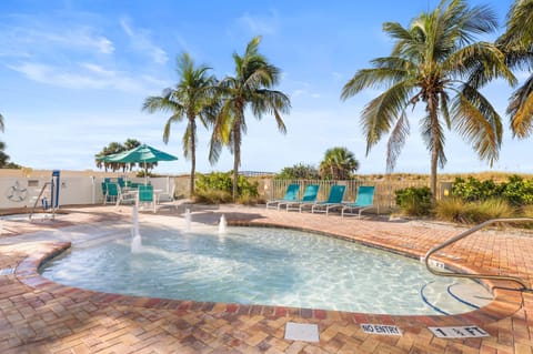 Soak in the sun, just steps from the beach and nestled among tropical landscaping.