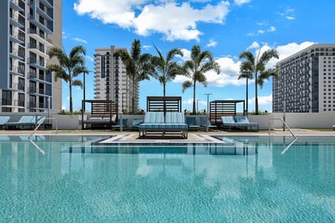 Dive into relaxation at this resort-style pool, surrounded by swaying palms and luxurious loungers.