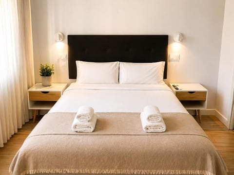 Classic Apartment | Down comforters, individually decorated, individually furnished