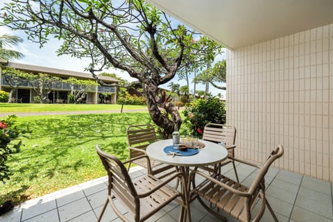 Enjoy al fresco meals on this shaded patio, surrounded by a beautiful garden and mature trees.
