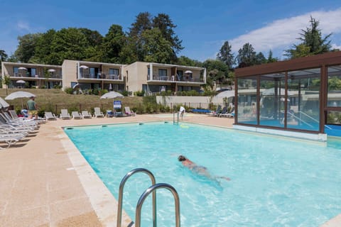 The sparkling outdoor pool invites you to unwind after a day exploring the Loire Valley's famous châteaux and vineyards.