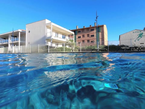 Crystal-clear waters of the heated outdoor pool, refreshing and inviting from the first warm days of spring through to autumn.
