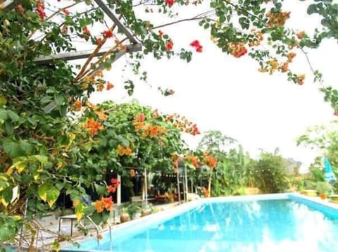 Basic Triple Room, Garden View | Pool | Outdoor pool