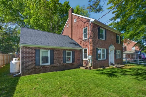 Charming brick home with shaded yard and timeless curb appeal