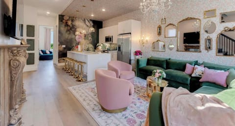 Second-floor open concept living space with modern luxury decor.