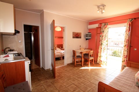 Family Apartment, 1 Bedroom | Living area | Flat-screen TV, table tennis