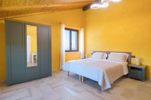 Comfort Quadruple Room, Courtyard View | Desk, laptop workspace, blackout drapes, soundproofing
