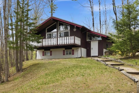 Tucked among the trees, this chalet offers a peaceful White Mountains retreat.