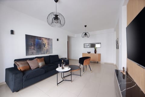Bright and inviting living area with modern design, perfect for relaxing after a day of exploring.