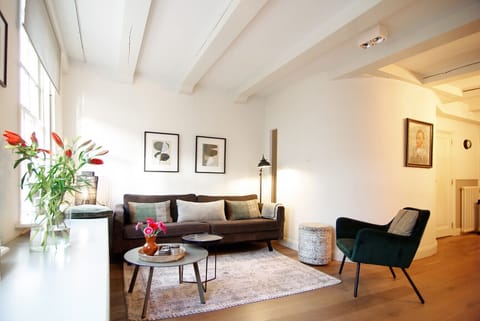 Living area with comfortable seating and plenty of lighting