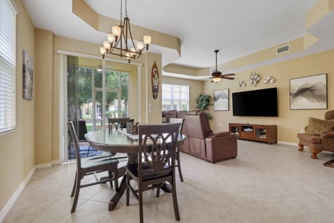 Open, comfortable living spaces make it easy to spend time together; slide open the doors and enjoy the indoor-outdoor Florida lifestyle.