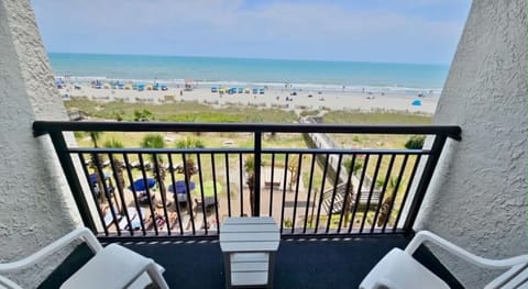 Relax and enjoy the ocean breeze on your private balcony - your perfect place to unwind.