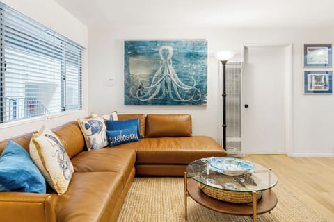 Artistic coastal touches and comfortable leather seating make this the perfect spot to unwind.