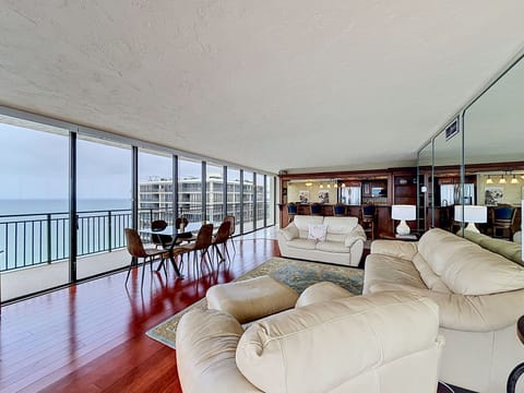 Spacious Living Area with Balcony Access and Gulf Views