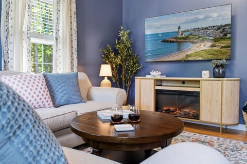 A warm and inviting living room designed for comfort, relaxation, and memorable moments with your group.