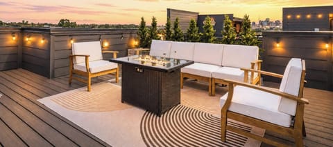 Kick back by the fire pit, and catch the sunset on your own private rooftop deck.