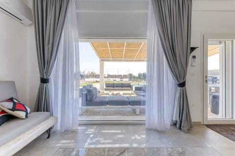 Villa, Patio, Pool View | Living area | Flat-screen TV