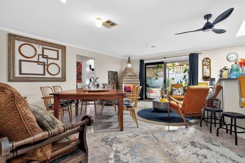 Unique pieces and eclectic décor run through the open living, dining, and lounge spaces, which flow effortlessly together to create plenty of room for gatherings.