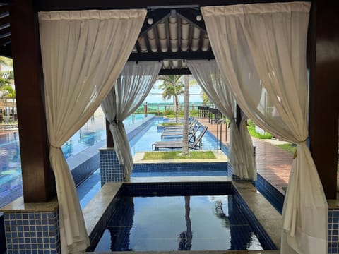 Outdoor pool, pool umbrellas, sun loungers