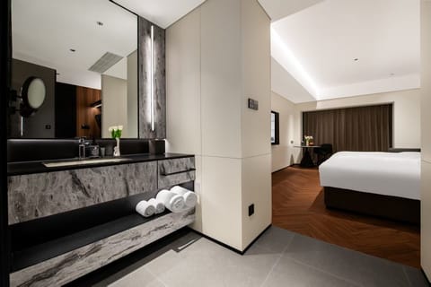 Business Twin Room, Non Smoking, City View | Bathroom | Separate tub and shower, hydromassage showerhead, designer toiletries