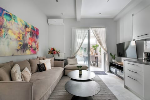 Deluxe Apartment, 2 Bedrooms, Kitchen, City View | Living room | 51-inch Smart TV with cable channels, Netflix, streaming services