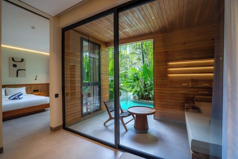 Deluxe Apartment, Poolside | In-room safe, desk, laptop workspace, iron/ironing board