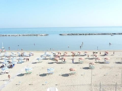Superior Quadruple Room, Balcony, Sea View | Beach | Private beach, white sand, sun loungers, beach umbrellas